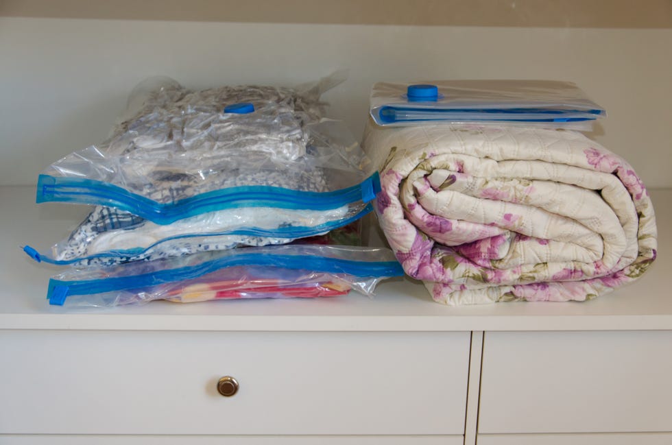 how to get rid of moths, vacuum sealing clothes, duvets and blankets