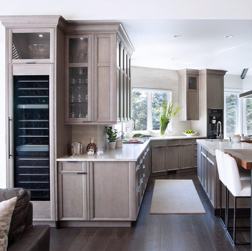 custom cabinets from rutt fit the kitchen precisely for a fully built in look