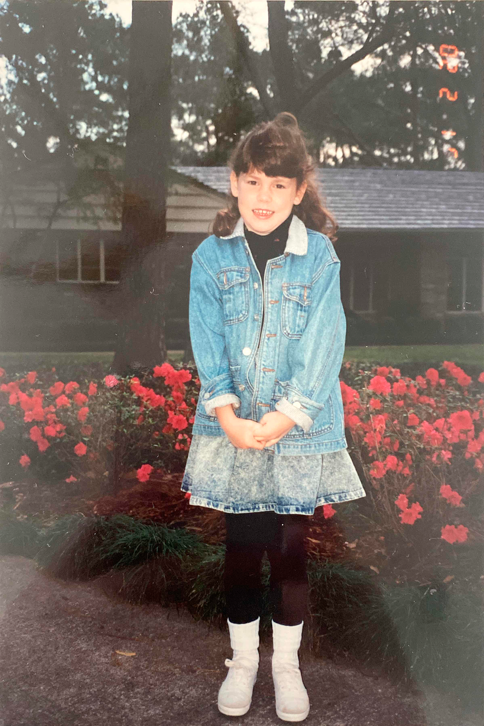 katie davis in front of home